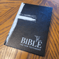 The New Testament Bible on Black Paper